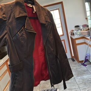 Jacket red inside but showing up pink in photo